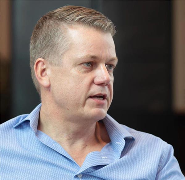 Middle-aged caucasian male with light brown hair